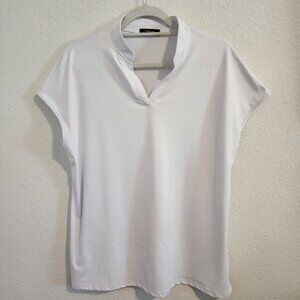 Vidusou Women's white sleeveless V-neck blouse Size XL  Item 0822242BL
